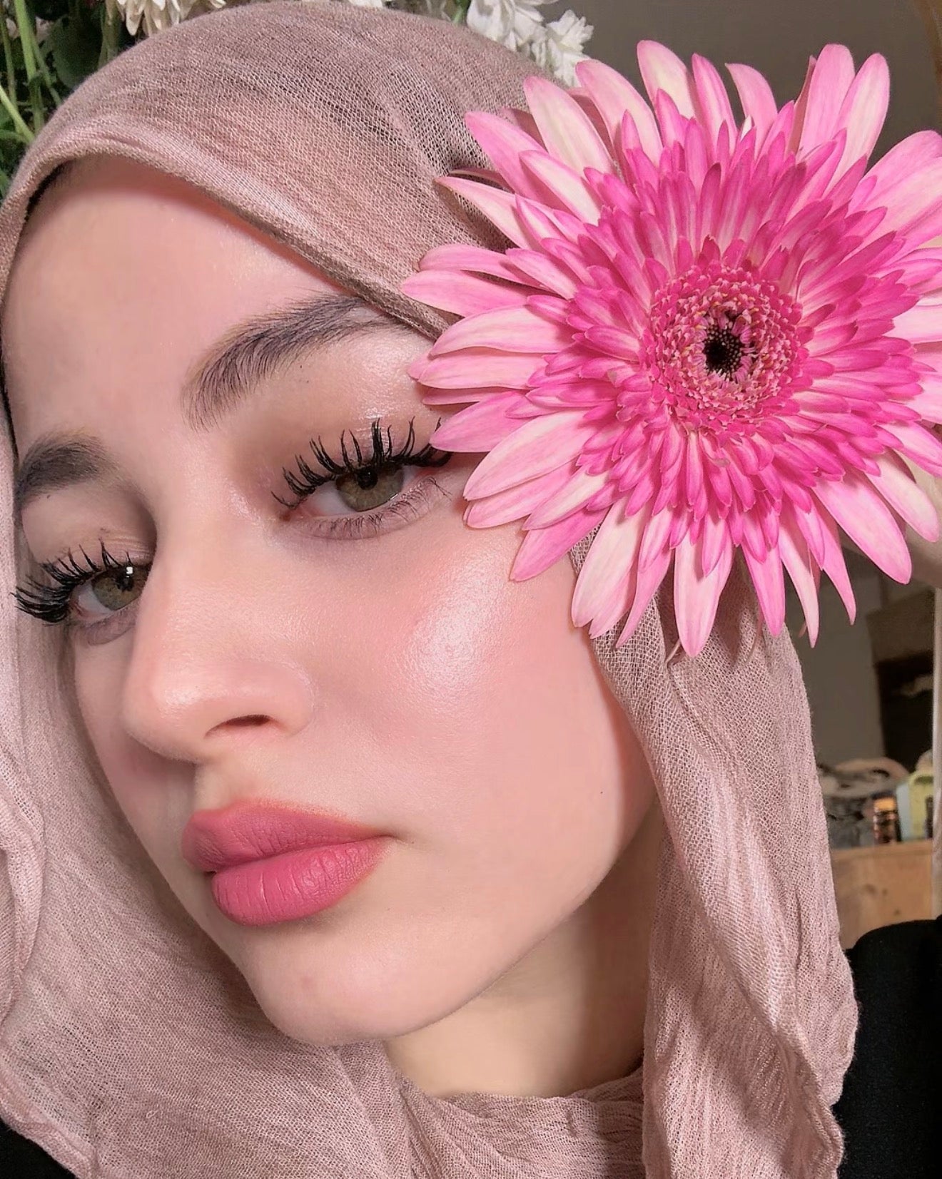 عين